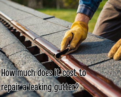 a leaking gutter under repair by a roofer
